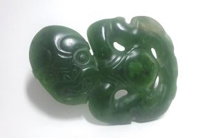 Greenstone tiki pendant by Al Brown