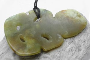 Tiki carved from lemon jade by Al Brown