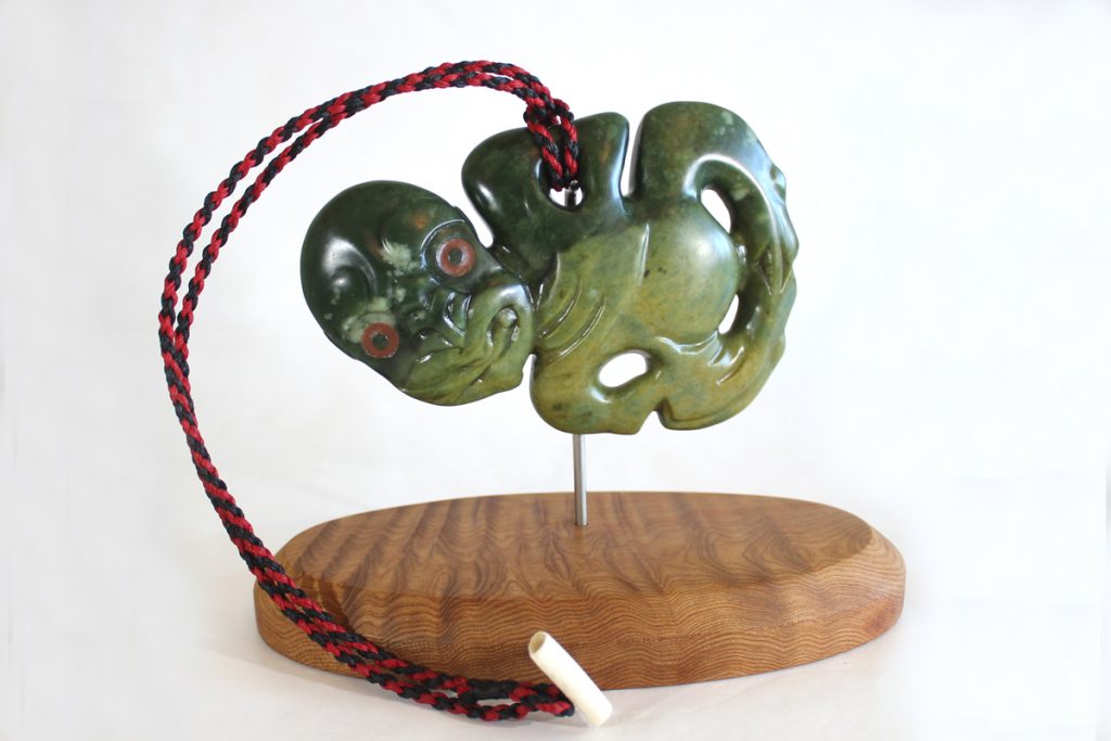Greenstone tiki by Al Brown