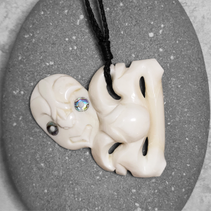 Bone Hei Tiki pendant