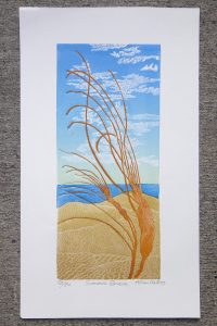 Colourful print of a beach scene, called 'Summer Breeze', by Allan Gale
