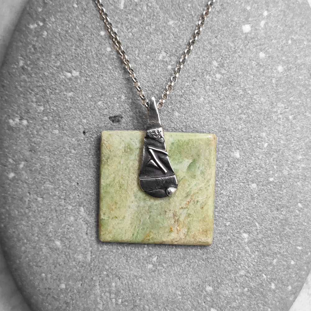 NZ Greenstone and silver pendant