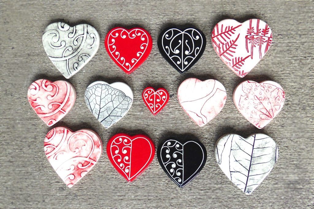 Ceramic red, black and white hearts by Borrowed Earth from Kura Gallery