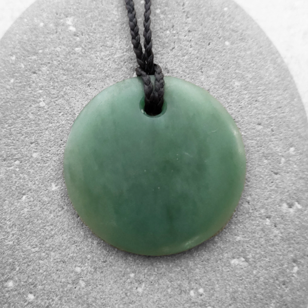 NZ Greenstone taurus disc pendant