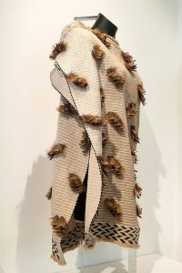 Woven maori cloak with pheasant feathers by Gary Grace