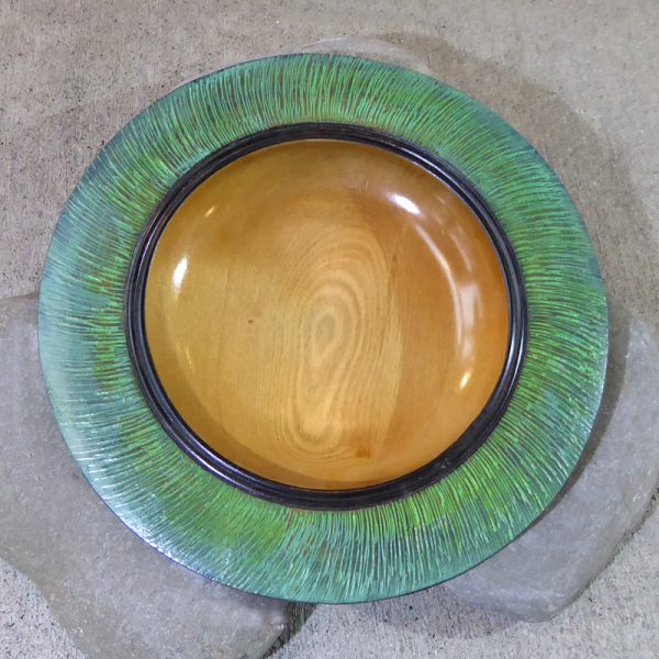 Bowl carved from NZ rimu with green edge by Hugh Mill