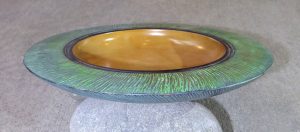 Bowl carved from NZ rimu with green edge by Hugh Mill