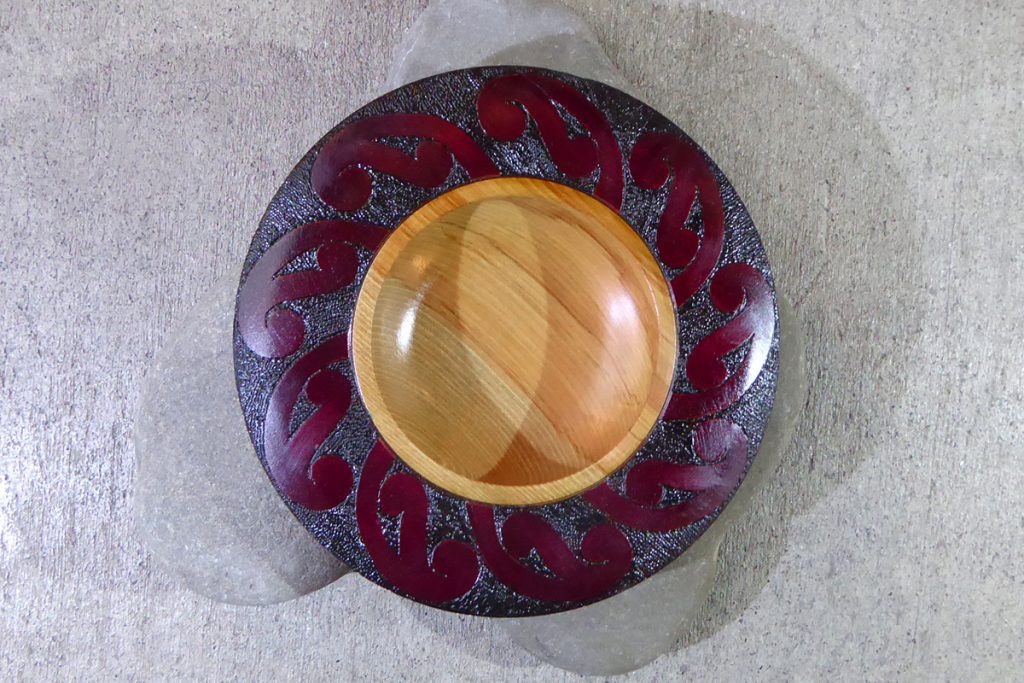 NZ rimu carved bowl with red edge by Hugh Mill