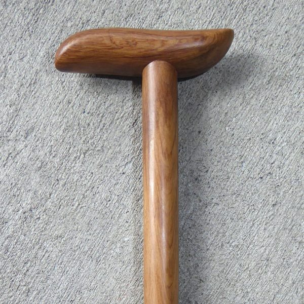 Walking stick carved from New Zealand maire wood by Johnny Hauraki