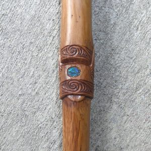 Walking stick carved from New Zealand maire wood by Johnny Hauraki