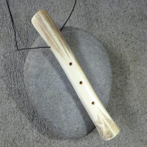 Deerbone koauau or flute carved by Owen Mapp