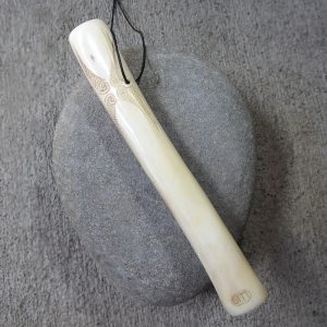 Deerbone koauau or flute carved by Owen Mapp