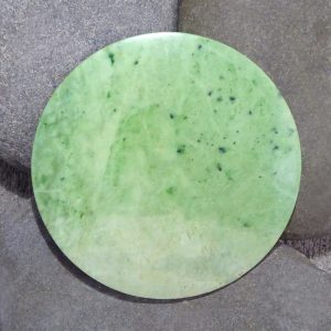 Large NZ greenstone kopae or disc by Raegan Bregmen