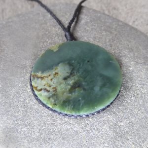 NZ greenstone disc pendant by Raegan Bregmen