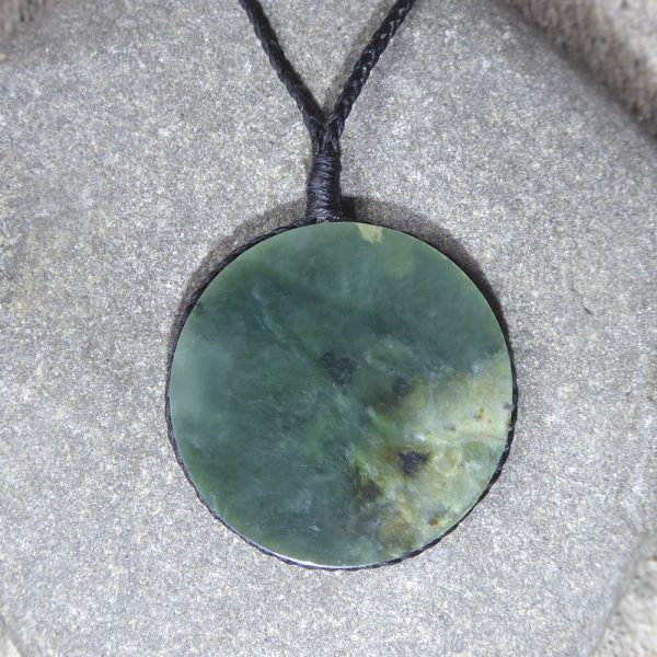 NZ greenstone disc pendant by Raegan Bregmen