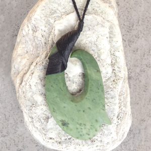 Greenstone matau or hook pendant by Raegan Bregmen