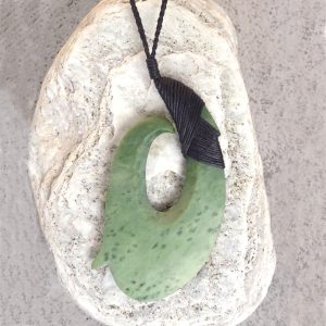 Greenstone matau or hook pendant by Raegan Bregmen