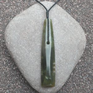 Greenstone adze or toki pendant by Raegan Bregmen