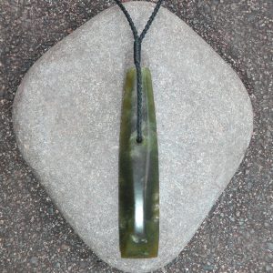 Greenstone adze or toki pendant by Raegan Bregmen