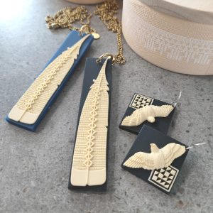 Pendants with NZ Huia feather design by Tania Tupu