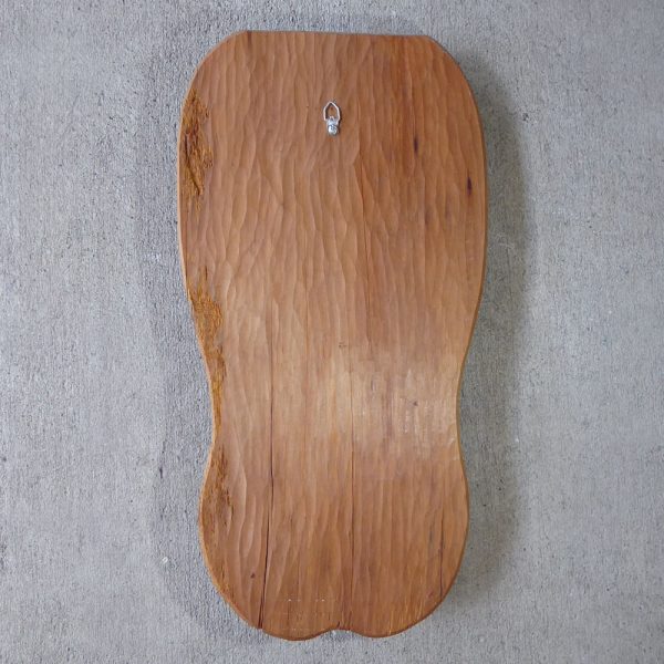 Back of a carved wooden face by Teraiman Tahiata
