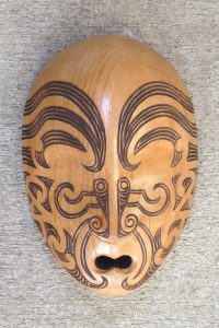 Carved wood mask with maori tattoo/moko by Thomas Hansen