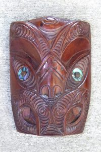 Carved wooden maori wheku by Thomas Hansen