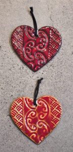 Small patterned red ceramic hearts by Michelle Bow